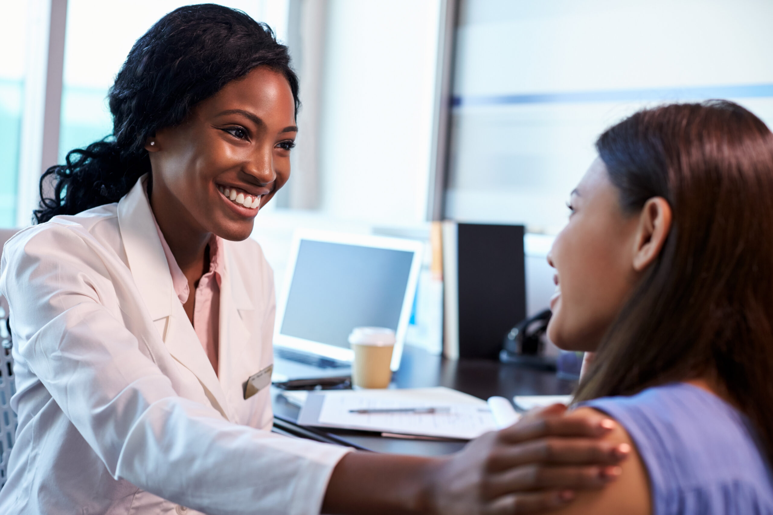 Doctor reassuring patient Doctor reassuring patient