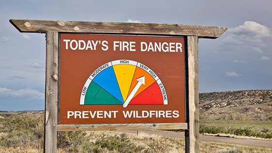 high fire danger roadside sign in Colorado Abstract photo showing DERMS and related technologies