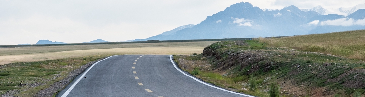 Road curve toward mountains