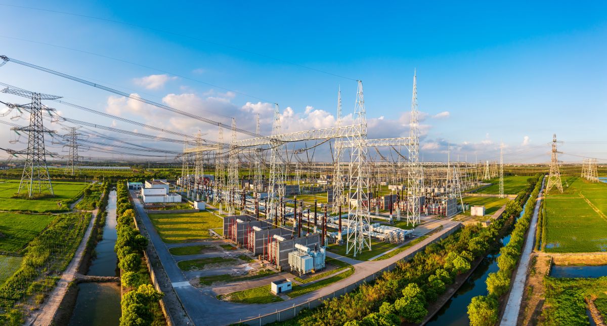 aerial shot of a large power plant and surrounding infrastructure